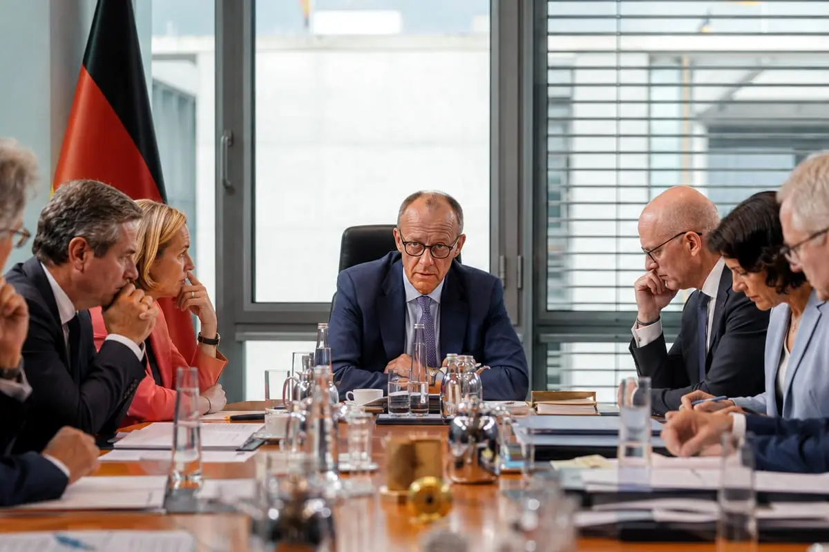 J. Spahno skandalas supurtė F. Merzo valdžią: kancleris jau neatmeta Vokietijos vyriausybės pertvarkos