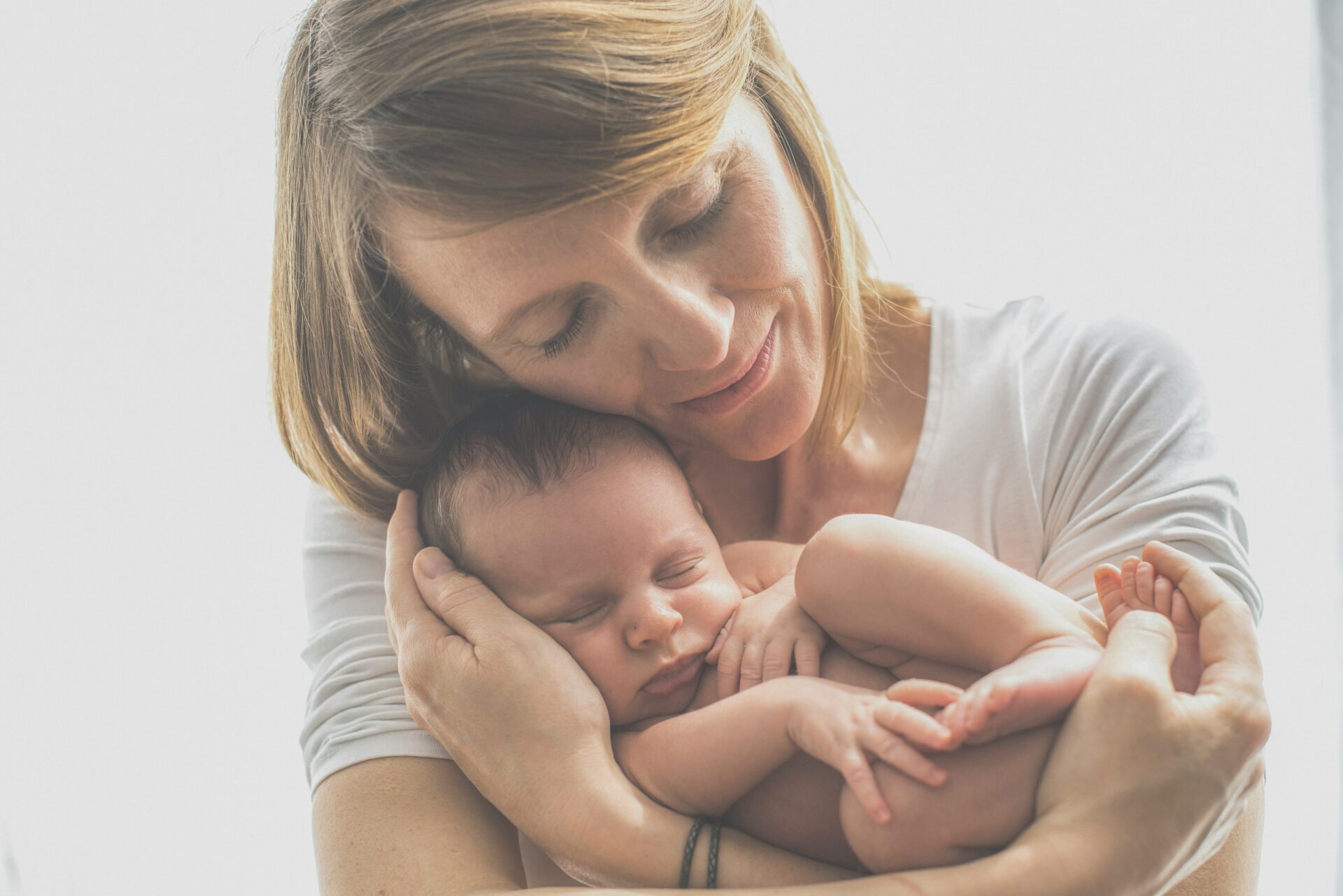 Mama ir kūdikis. Unsplash nuotrauka